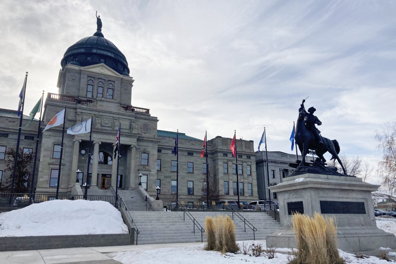 A photo shows the exterior of the Montana Capitol.